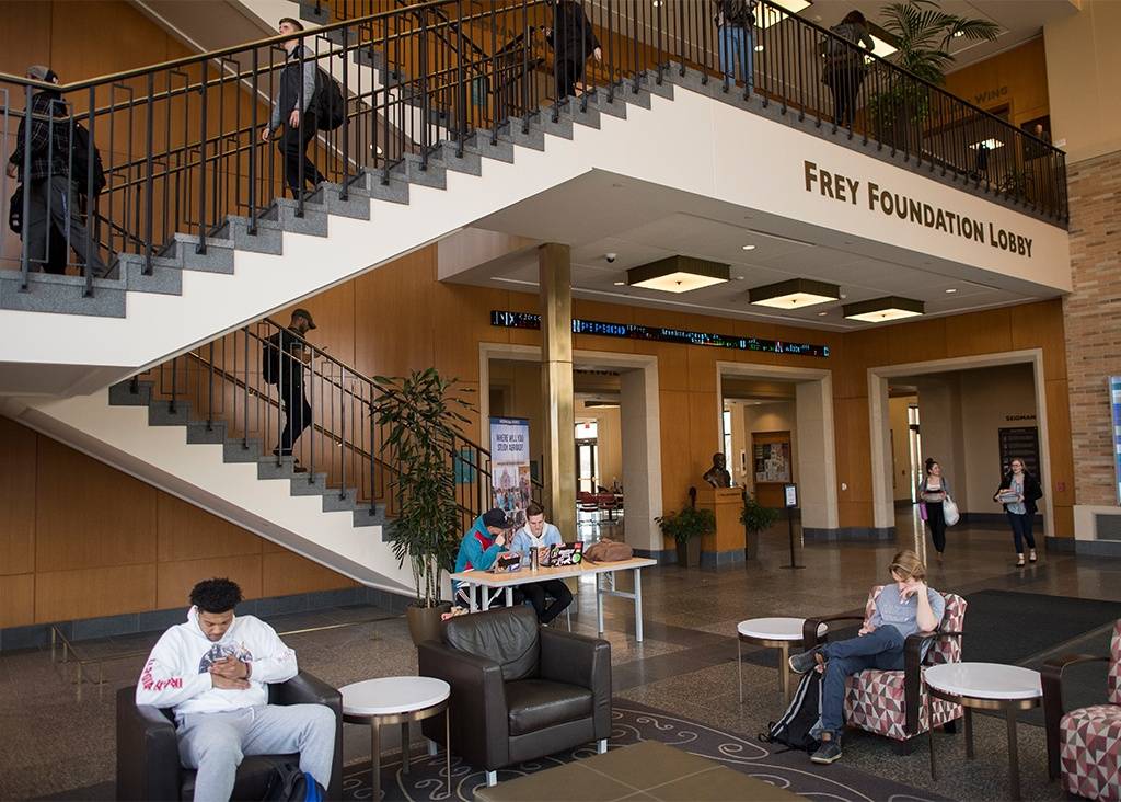 Seidman students reading in the Frey Foundation Lobby.